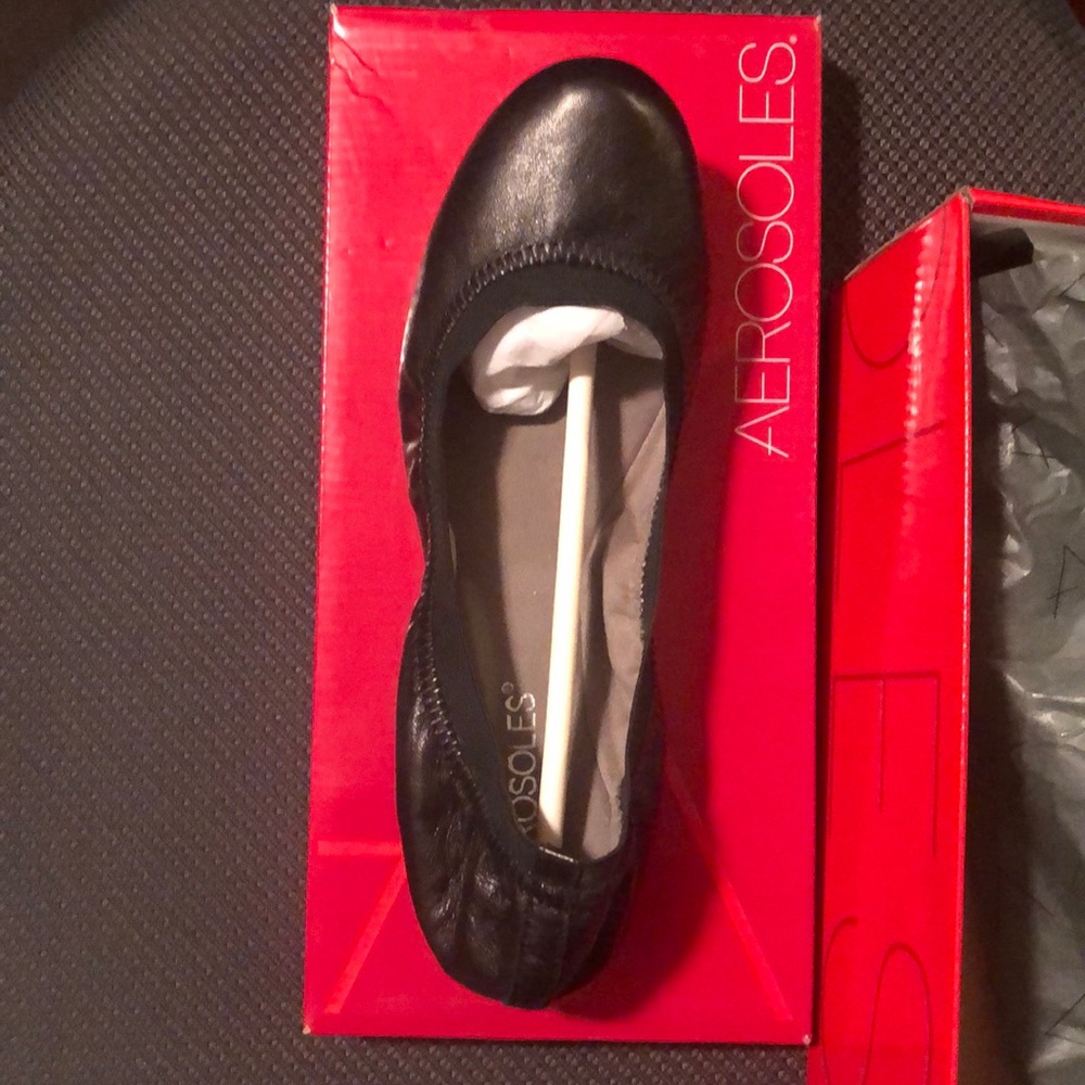 Black leather ballet flats